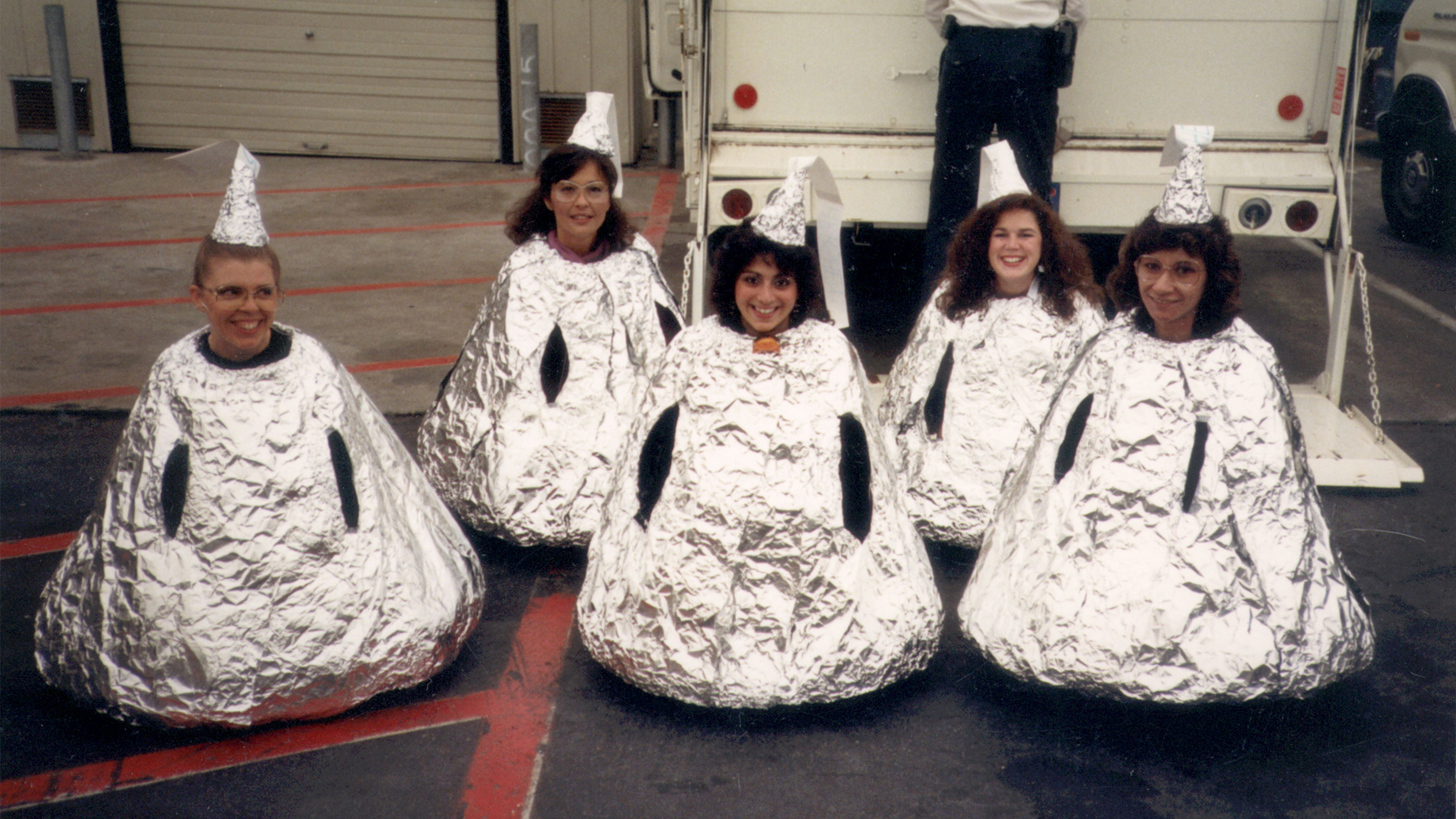 1989 Halloween Ho-Ho with security personnel dressed as Hershey kisses. Photo courtesy of Sandy Smith (pictured alongside Carol Nellen, Tamara Rusher and Kathy Vega).