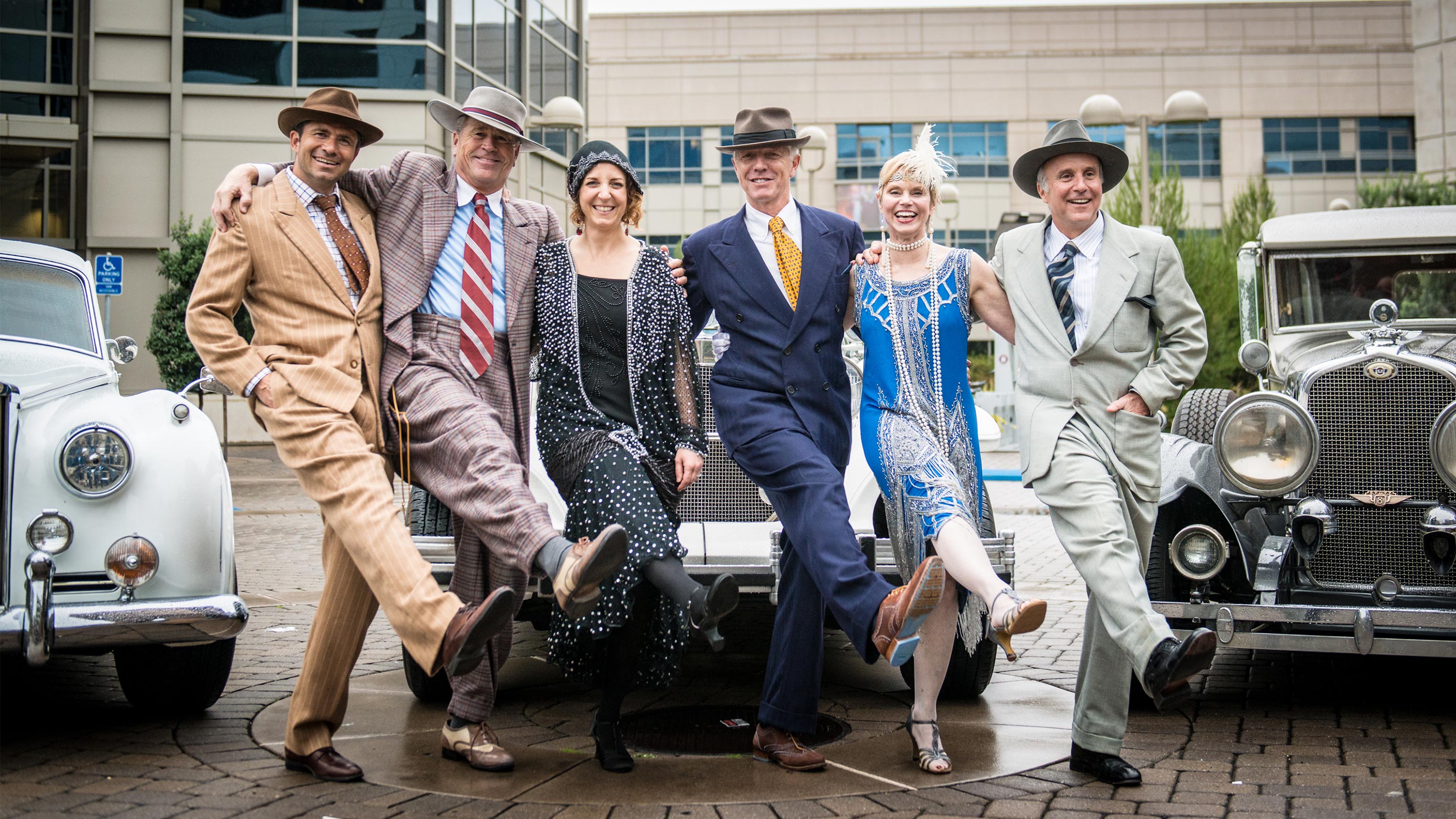 2014 Halloween photo of Genentech Executive Committee members dressed in Great Gatsby-era ensembles.